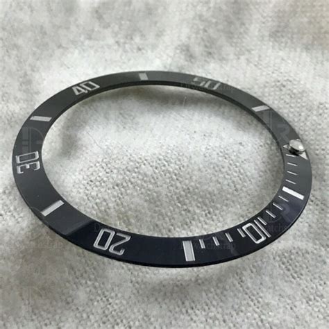 rolex submariner ceramic bezel replacement cost